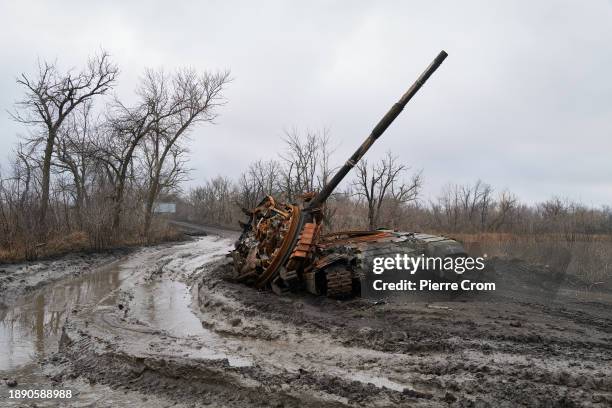 Ukrainian tank is destroyed amid artillery shelling on December 31, 2023 in Avdiivka, Ukraine. The remaining residents of Avdiivka are living in...