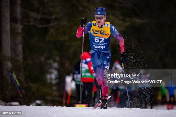 Ben Ogden of the United States in action competes during the FIS World Cup Cross - Country Tour de Ski 10km on December 31, 2023 in Toblach...