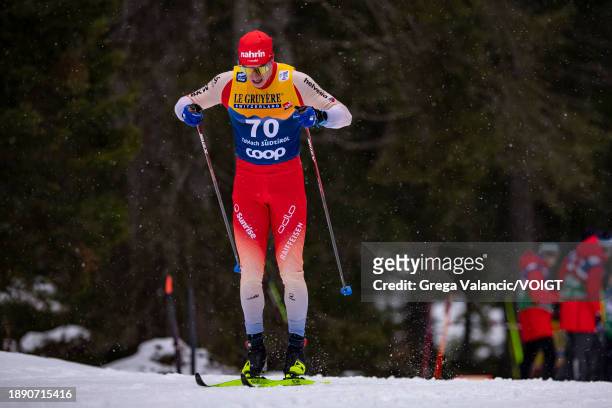 Janik Riebli of Switzerland in action competes during the FIS World Cup Cross - Country Tour de Ski 10km on December 31, 2023 in Toblach...