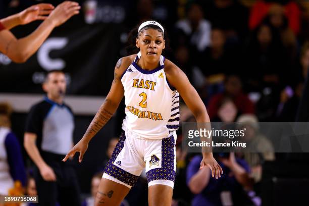 Tatyana Wyche of the East Carolina Lady Pirates works on defense against the South Carolina Gamecocks in Williams Arena at Minges Coliseum on...