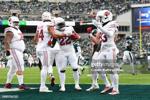 Michael Carter of the Arizona Cardinals celebrates with teammates after scoring a touchdown during the second half against the Philadelphia Eagles at...