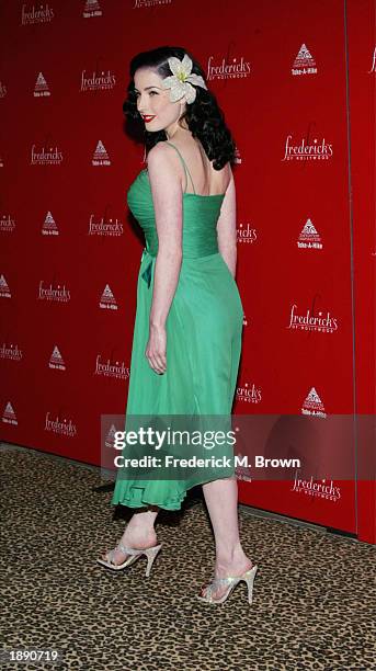 Model Dita Von Teese attends the Frederick's of Hollywood Fall 2003 fashion show and auction at Smashbox Studios April 1, 2003 in Los Angeles,...