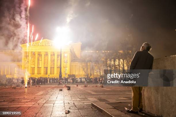 People gather to celebrate the new year in the Heroes' Square in Budapest, Hungary on January 01, 2024.