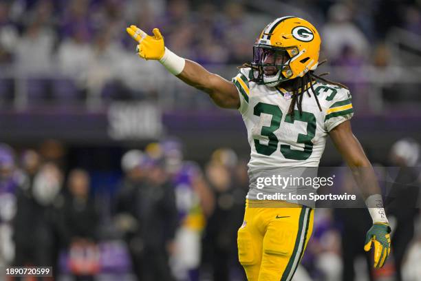 Green Bay Packers running back Aaron Jones ;let's the crowd know it's first down at the end of an 8-yard run during the second quarter of an NFL game...