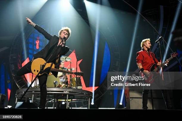 In this image released on December 31 Tré Cool, Billie Joe Armstrong and Mike Dirnt of Green Day perform during Dick Clark's New Year's Rockin' Eve...