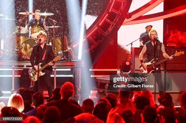 In this image released on December 31 Tré Cool, Billie Joe Armstrong and Mike Dirnt of Green Day perform during Dick Clark's New Year's Rockin' Eve...