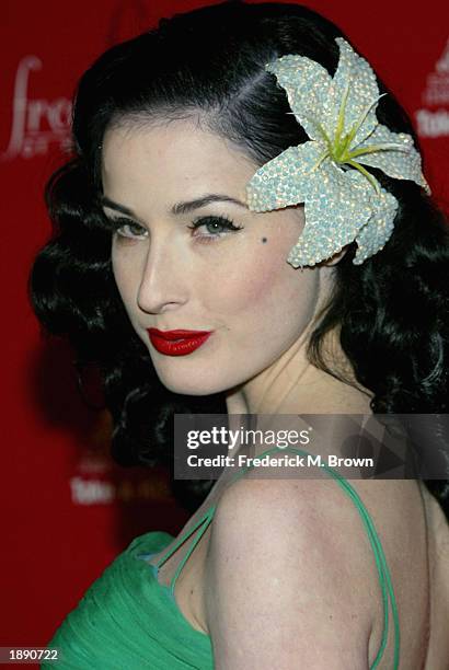 Model Dita Von Teese attends the Frederick's of Hollywood Fall 2003 fashion show and auction at Smashbox Studios April 1, 2003 in Los Angeles,...