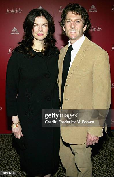 Actress Jeanne Tripplehorn and husband actor Leland Orser attend the Frederick's of Hollywood Fall 2003 fashion show and auction at Smashbox Studios...