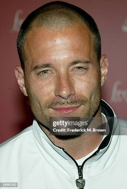 Model Johnny Musler attends the Frederick's of Hollywood Fall 2003 fashion show and auction at Smashbox Studios April 1, 2003 in Los Angeles,...