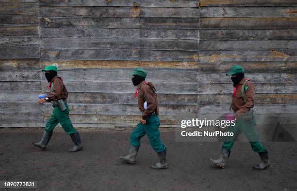 Members of the Zapatista Army of National Liberation are carrying out rounds at El Caracol Rebeldia y Resistencia in the mountains of southeast...