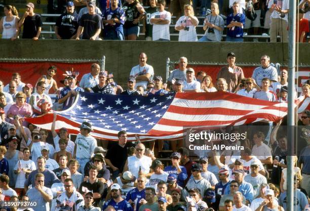 Large American Flag is displayed by fans of the New England Patriots in the first game following the September 11, 2001 Attacks in the game between...