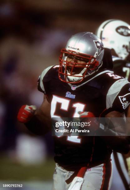 Inside Linebacker Bryan Cox of the New England Patriots rushes in the first game following the September 11 Attacks in the game between the New York...