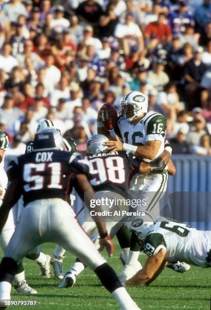 Defensive End Anthony Pleasant of the New England Patriots pressures Quarterback Vinny Testaverde of the New York Jets in the first game following...