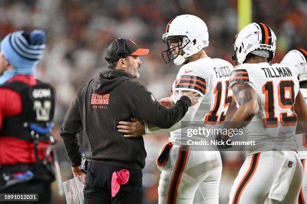 Head Coach Kevin Stefanski interacts with Quarterback Joe Flacco after a play against the New York Jets at Cleveland Browns Stadium on December 28,...
