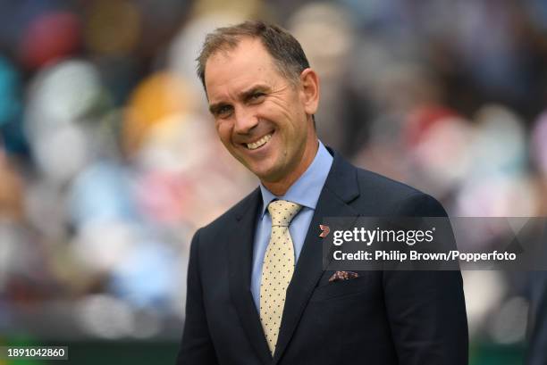 Justin Langer, working for Channel 7 smiles during day four of the Second Test Match between Australia and Pakistan at Melbourne Cricket Ground on...