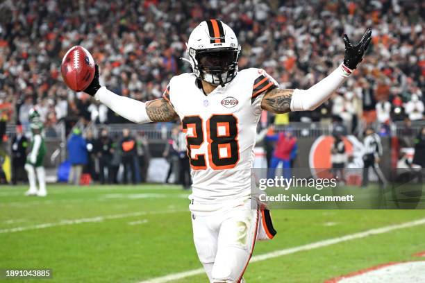 Mike Ford of the Cleveland Browns celebrates after a fumble recovery against the New York Jets at Cleveland Browns Stadium on December 28, 2023 in...