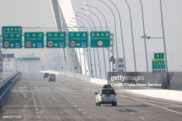 Cars drive on the bridge on the Beijing-Xiong'an Expressway on December 28, 2023 in Beijing, China. The Beijing section of the Beijing-Xiong'an...