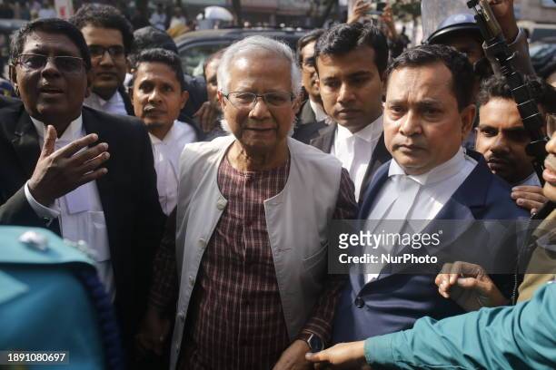 Nobel Peace Laureate Dr. Muhammad Yunus, accompanied by his lawyers, is arriving at the Labour Court in Dhaka, Bangladesh, on January 1, 2024.