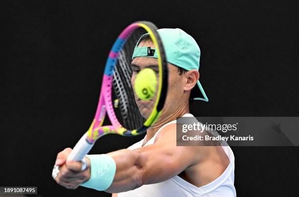 Rafael Nadal plays a shot as he practices on court ahead of the 2024 Brisbane International at Queensland Tennis Centre on December 29, 2023 in...