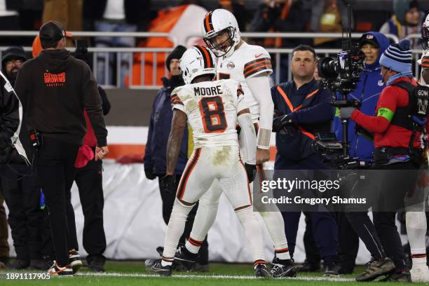 Joe Flacco and Elijah Moore of the Cleveland Browns celebrate a touchdown in the first half against the New York Jets at Cleveland Browns Stadium on...