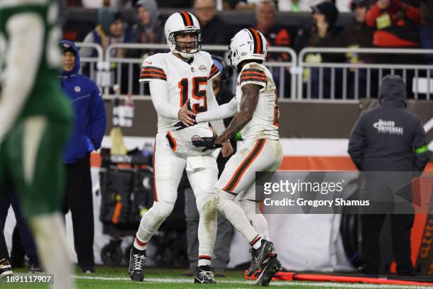 Joe Flacco and Elijah Moore of the Cleveland Browns celebrate a touchdown in the first half against the New York Jets at Cleveland Browns Stadium on...