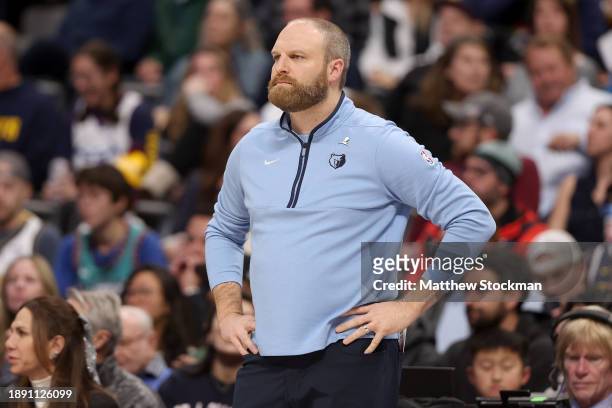 Head coach Taylor Jenkins of the Memphis Grizzlies watches as his team plays the Denver Nuggets in the first quarter at Ball Arena on December 28,...