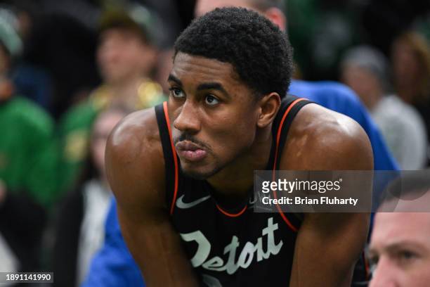 Jaden Ivey of the Detroit Pistons watches from the bench after fouling out of a game against the Boston Celtics during overtime at TD Garden on...