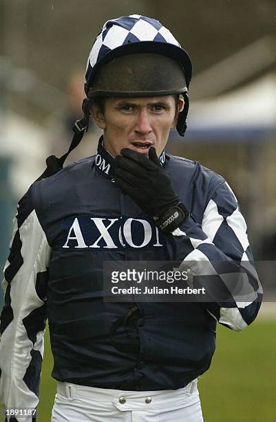 Champion jockey Tony McCoy leaves The Wieghing Room before riding Deano's Beeno to victory in The sportingoptions.co.uk Long Distance Hurdle Race run...