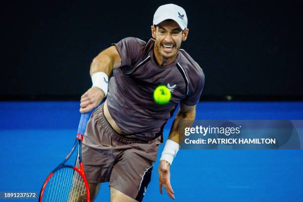 Britain's Andy Murray serves against Bulgaria's Grigor Dimitrov during their men's singles match at the Brisbane International tennis tournament, at...