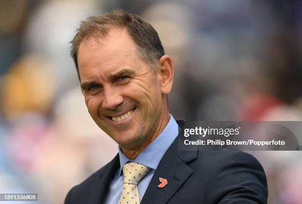 Justin Langer, working for Channel 7 smiles during day four of the Second Test Match between Australia and Pakistan at Melbourne Cricket Ground on...