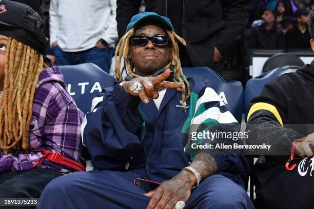 Lil Wayne attends a basketball game between the Los Angeles Lakers and the Charlotte Hornets at Crypto.com Arena on December 28, 2023 in Los Angeles,...