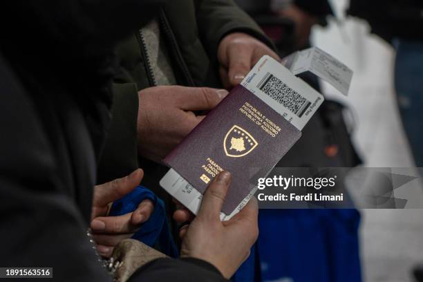 Kosovar woman, winner of a Government founded lottery for the first visa free flight to a Schengen country waits for passport control at Prishtina...