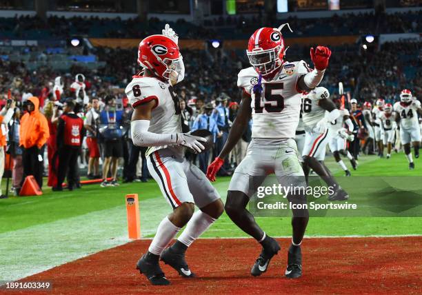 Georgia Bulldogs Defensive Back Daylen Everette and Georgia Bulldogs Defensive Back Daniel Harris celebrate an interception during the Capital One...