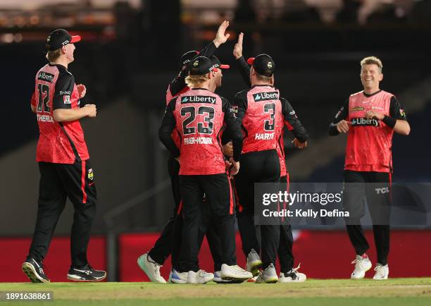 Renegades celebrate the dismissal of Matthew Short of the Sixers during the BBL match between Melbourne Renegades and Adelaide Strikers at Marvel...