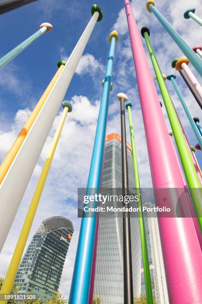 Coloris installation, created by Cameroonian artist Pascale Marthine Tayou, is composed of vibrant poles emerging from the different continents...