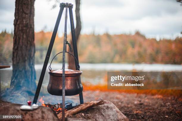 a kettle on fire - campfire stock pictures, royalty-free photos & images