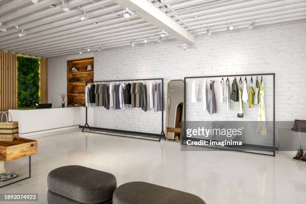 fashion store interior - clothing racks stock pictures, royalty-free photos & images