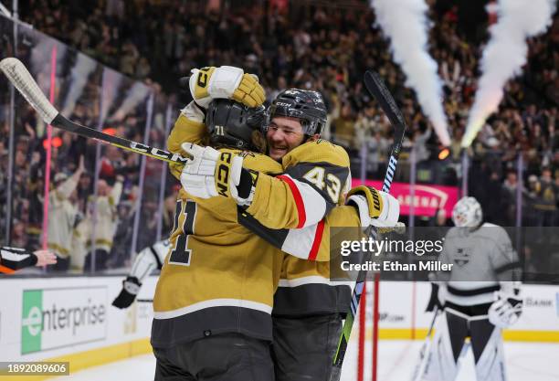 Paul Cotter and William Karlsson of the Vegas Golden Knights celebrate after Cotter assisted Karlsson on a second-period goal against the Los Angeles...