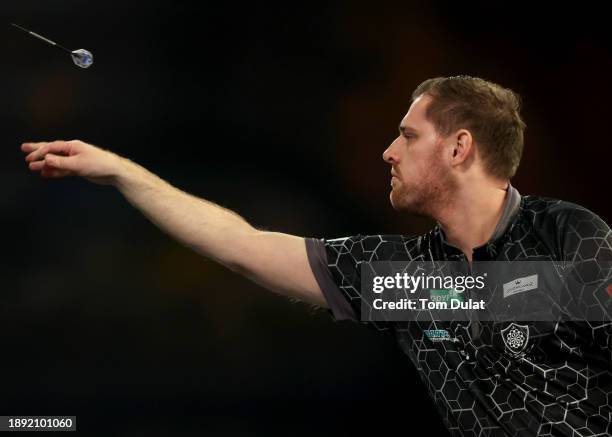 Berry van Peer of Netherlands throws during his round three match against Damon Heta of Australia on day 12 of the 2023/24 Paddy Power World Darts...