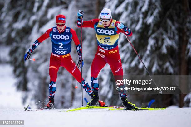 Harald Oestberg Amundsen of Norway and Erik Valnes of Norway in action during the FIS World Cup Cross - Country Tour de Ski Pursuit on January 1,...