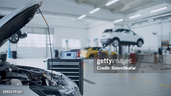 Cars Open Bonnet Parked In Garage For Repair And Maintenance Service Cars Open Bonnet Parked In Garage For Repair And Maintenance Service