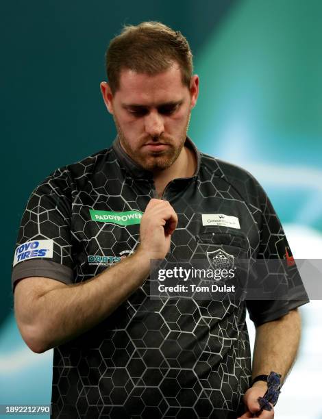 Berry van Peer of Netherlands reacts during his round three match against Damon Heta of Australia on day 12 of the 2023/24 Paddy Power World Darts...