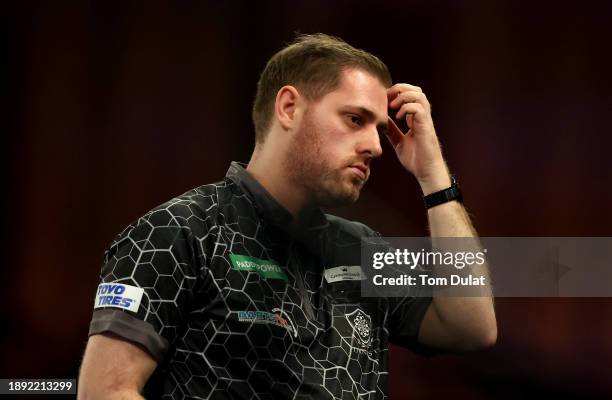 Berry van Peer of Netherlands reacts during his round three match against Damon Heta of Australia on day 12 of the 2023/24 Paddy Power World Darts...