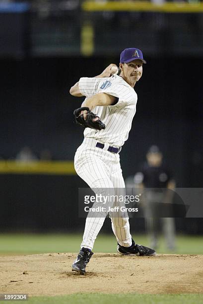 Pitcher Randy Johnson of the Arizona Diamondbacks delivers the ball during the MLB Opening Day game against the Los Angeles Dodgers at Bank One...