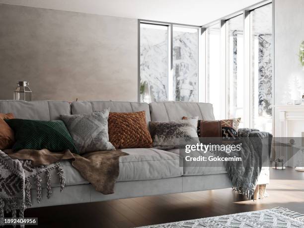 christmas interior in scandinavian style. cozy sofa by the panoramic window, festive living room interior. - cozy winter stock pictures, royalty-free photos & images