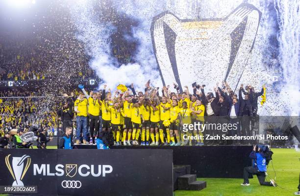 The Columbus Crew raise the trophy after the Audi MLS Cup Final game between Los Angeles FC and Columbus Crew at Lower.com Field on December 9, 2023...