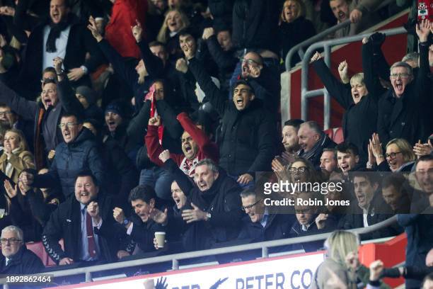 Prime Minister Rishi Sunak, a Southampton fan, gets to his feet and punches the air after Carlos Alcaraz of Southampton scores a goal to make it 1-0...