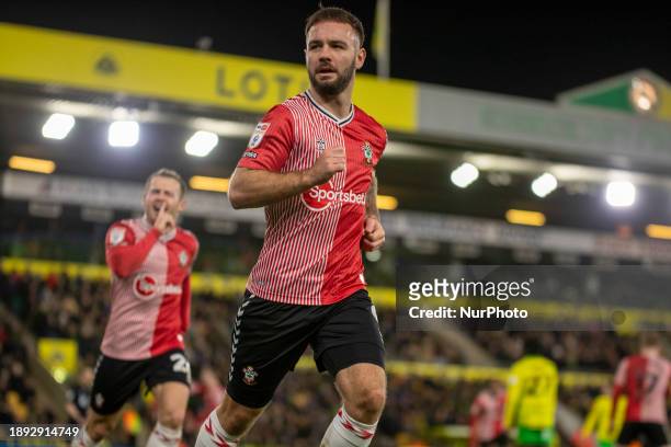 Adam Armstrong is celebrating after scoring the opening goal, making it 1-0 for Southampton, during the Sky Bet Championship match between Norwich...