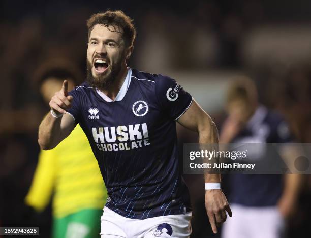 Tom Bradshaw of Millwall celebrates scoring the first goal during the Sky Bet Championship match between Millwall and Norwich City at The Den on...