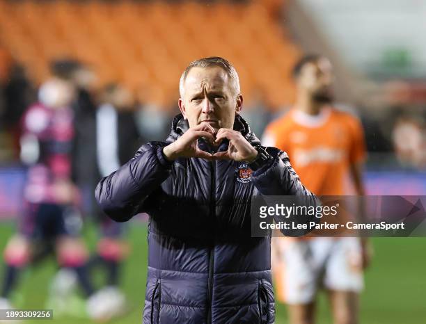Blackpool manager Neil Critchley makes a heart shape with his hands as he applauds the fans at the final whistle during the Sky Bet League One match...